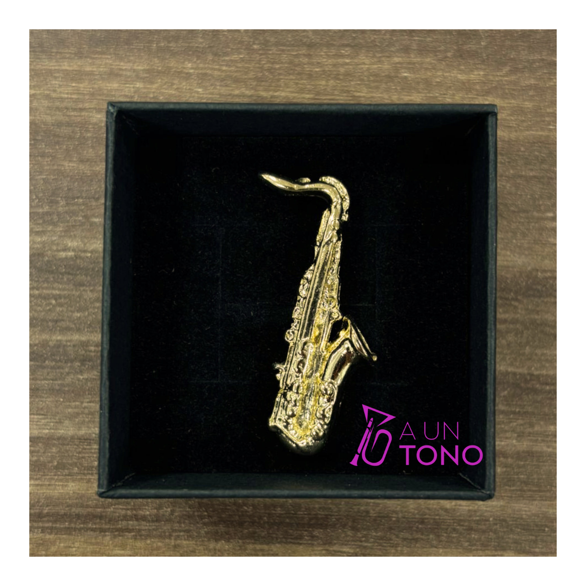 Golden saxophone pin