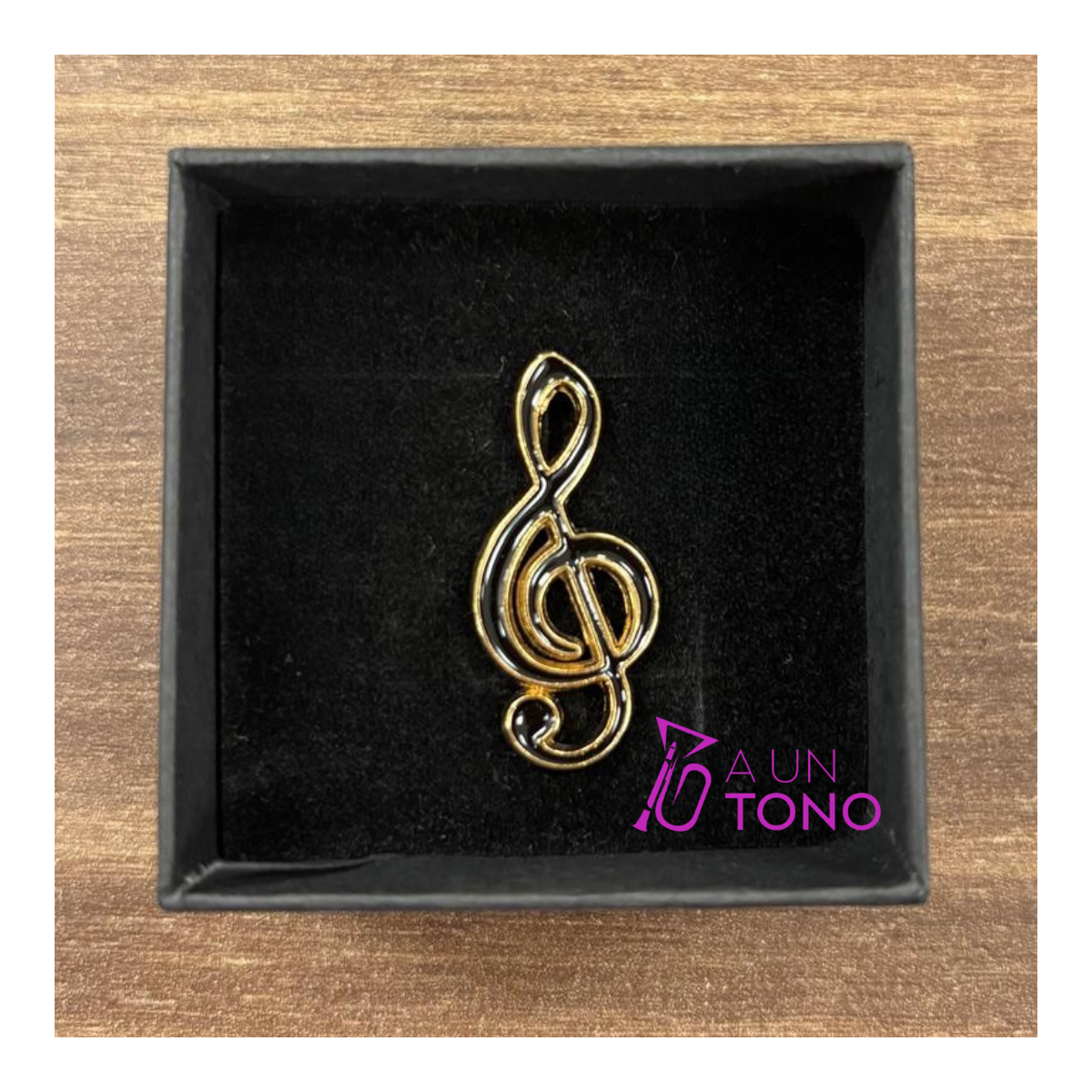 Black treble clef pin